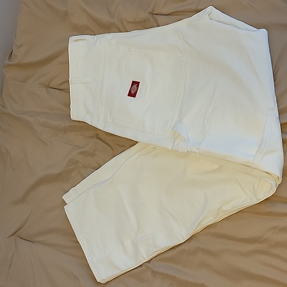 Men's white Dickies work wear carpenter jeans.